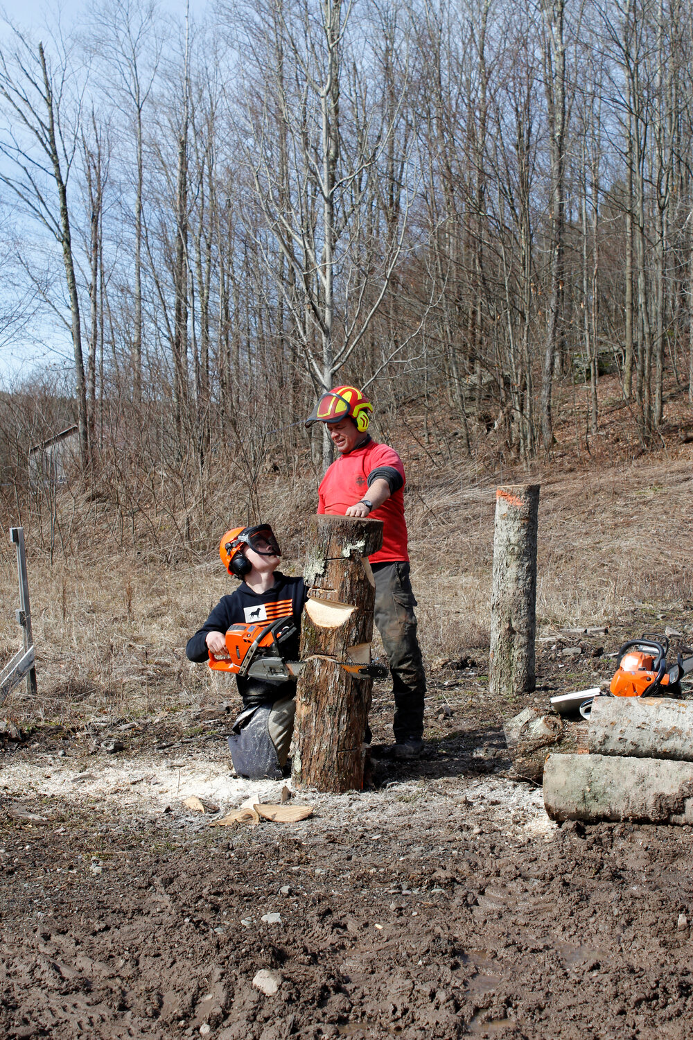 Student Jacob Butts looks to Game of Logging instructor Bill Lindloff for feedback on his just-completed cut during a chainsaw skills workshop at the DCMO BOCES Harrold Campus last week.